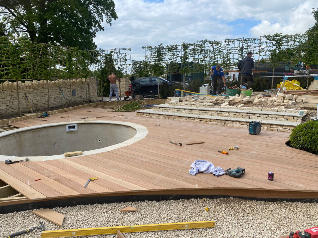 Garden build Decking in large contemporary garden in south cotswolds